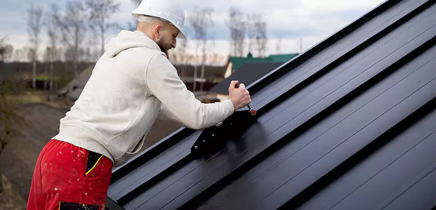 Tin Roof Ridge Cap Installation in Bedford